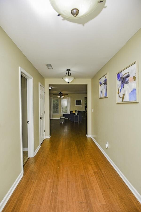 hallway featuring hardwood / wood-style floors