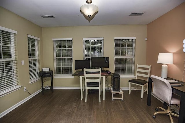 office space with dark hardwood / wood-style flooring