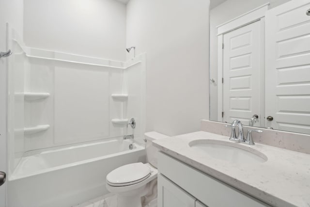 full bathroom featuring toilet, vanity, and bathtub / shower combination