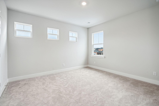 view of carpeted spare room