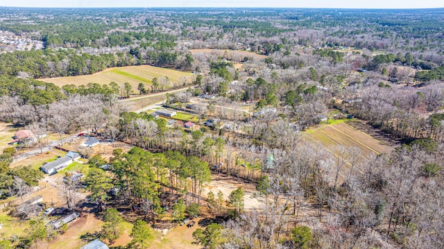 birds eye view of property with a rural view