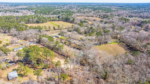 birds eye view of property featuring a rural view