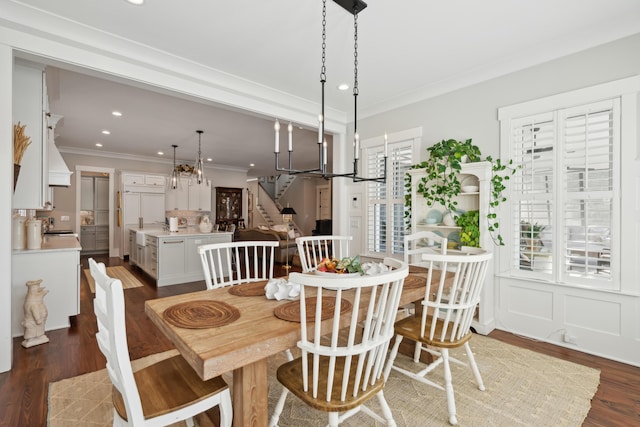 dining room featuring stairs, ornamental molding, dark wood-style flooring, and recessed lighting