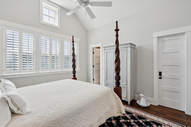 bedroom with lofted ceiling, ceiling fan, and dark wood-type flooring