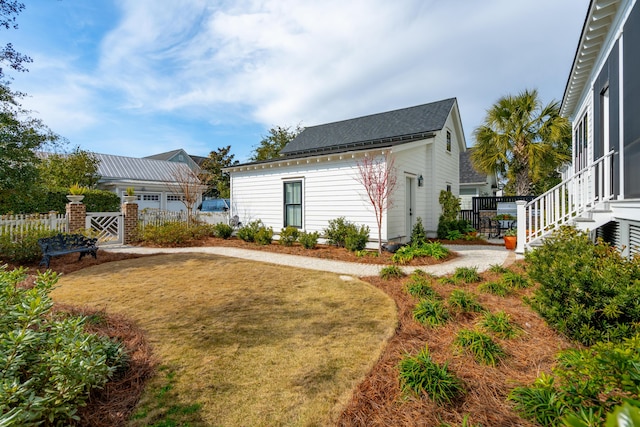 exterior space with entry steps and fence