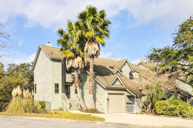 view of front of property with a garage