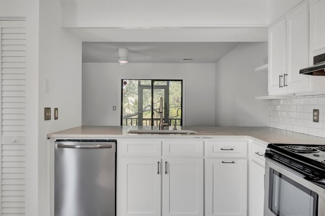 kitchen with sink, appliances with stainless steel finishes, white cabinets, decorative backsplash, and exhaust hood