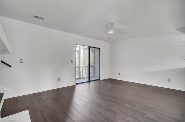 unfurnished room featuring dark hardwood / wood-style flooring and ceiling fan