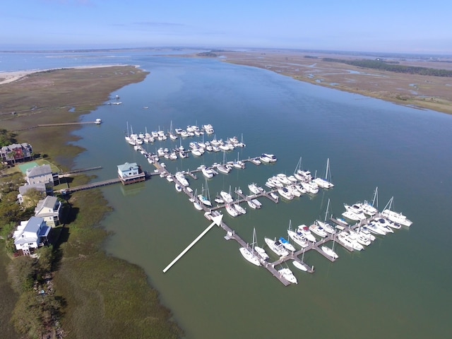 bird's eye view of a nearby body of water and a marina