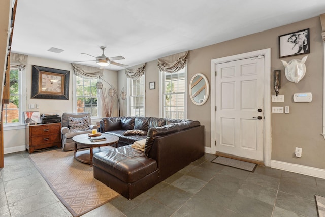 87 America St Unit A, B, C, Charleston, SC 29403 - living area with baseboards, ceiling fan, and stone tile flooring