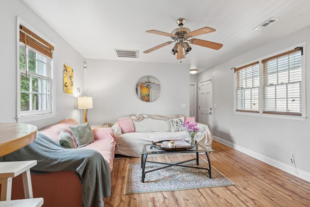 87 America St Unit A, B, C, Charleston, SC 29403 - living room featuring wood finished floors, ceiling fan, and baseboards