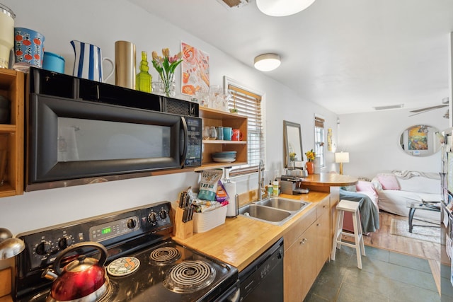 87 America St Unit A, B, C, Charleston, SC 29403 - kitchen with black appliances, a sink, tile patterned floors, and open floor plan