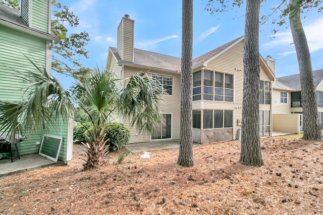 back of house featuring a patio