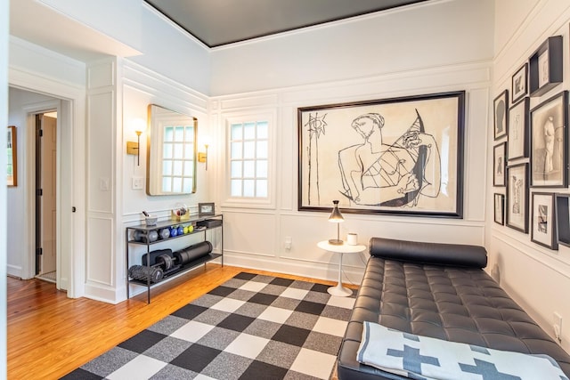 entrance foyer featuring a decorative wall and dark wood-style floors