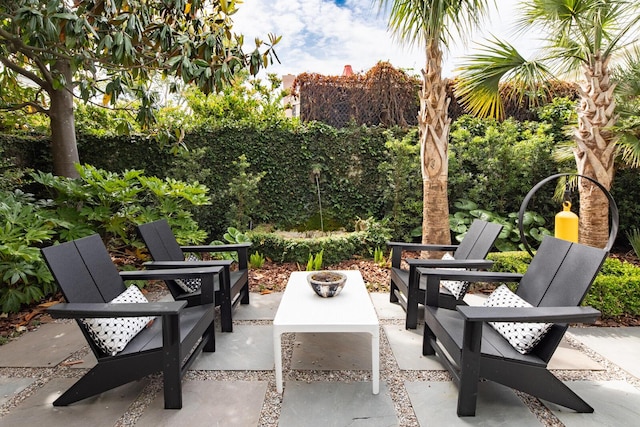 view of patio featuring fence