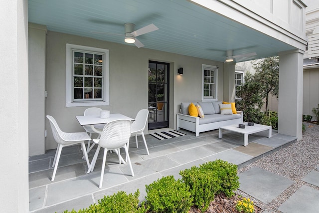 view of patio featuring ceiling fan and outdoor dining space
