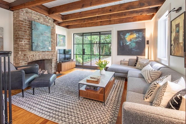 sunroom featuring beamed ceiling