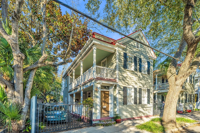 view of front of house featuring a balcony