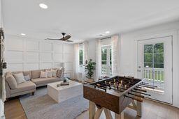 recreation room featuring a ceiling fan, recessed lighting, and wood finished floors