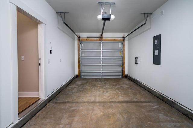 garage featuring a garage door opener and electric panel