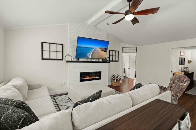 living room featuring dark wood-type flooring, vaulted ceiling with beams, a large fireplace, and ceiling fan