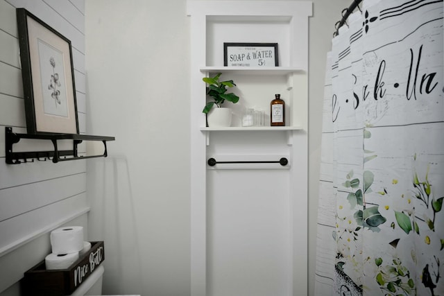 bathroom with curtained shower