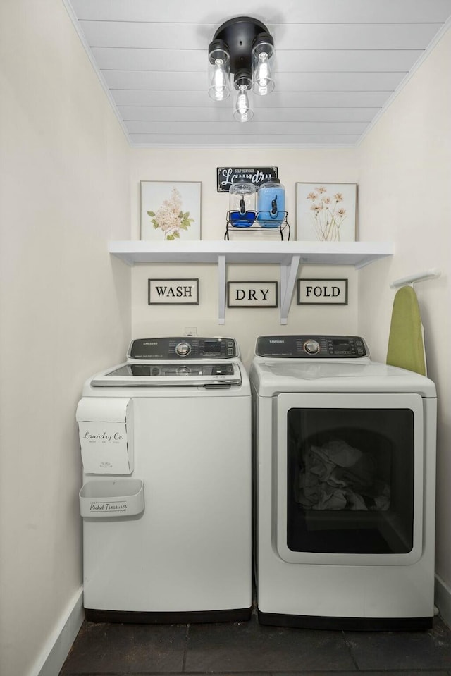 laundry room featuring separate washer and dryer