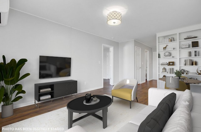 259 E Bay St Unit 7C, Charleston, SC 29401 - living room featuring wood finished floors, baseboards, and a wall mounted AC