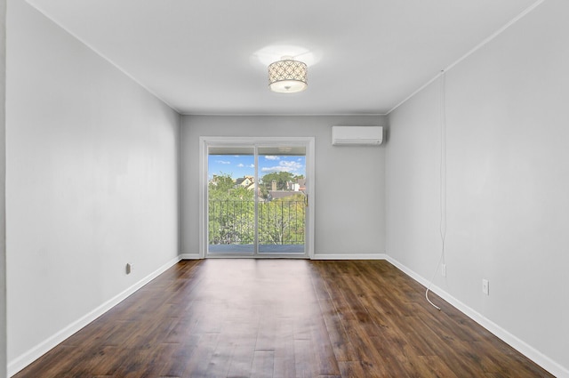 259 E Bay St Unit 7C, Charleston, SC 29401 - unfurnished room featuring a wall mounted AC, dark wood finished floors, and baseboards