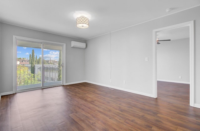 259 E Bay St Unit 7C, Charleston, SC 29401 - spare room featuring a wall unit AC, dark wood finished floors, baseboards, and ceiling fan