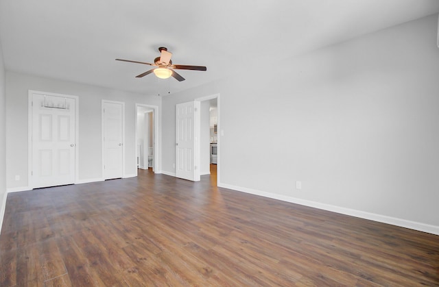 259 E Bay St Unit 7C, Charleston, SC 29401 - unfurnished living room featuring a ceiling fan, baseboards, and dark wood-style flooring