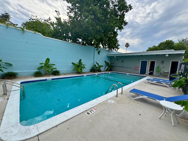 259 E Bay St Unit 7C, Charleston, SC 29401 - community pool featuring a patio