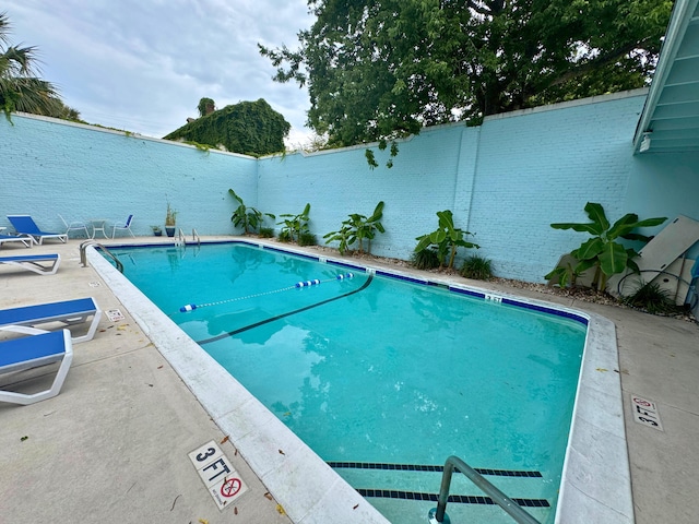 259 E Bay St Unit 7C, Charleston, SC 29401 - community pool featuring a fenced backyard and a patio