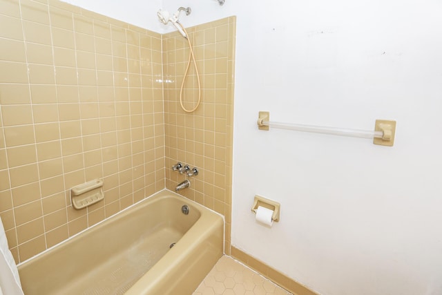 bathroom featuring shower / bath combination and tile patterned floors