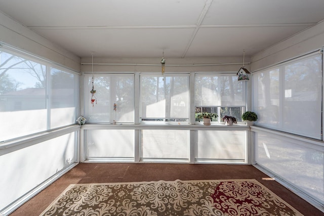 unfurnished sunroom featuring a healthy amount of sunlight