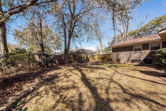 view of yard with fence