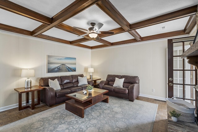 living area with visible vents, coffered ceiling, beam ceiling, and baseboards