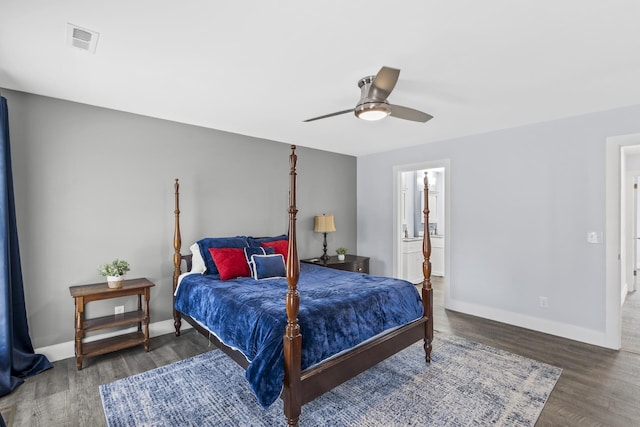 bedroom with a ceiling fan, baseboards, visible vents, and wood finished floors