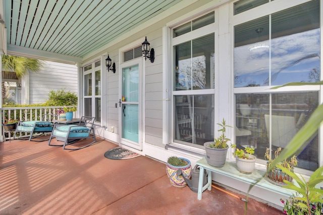 view of patio featuring a porch