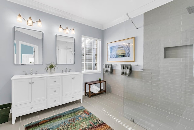 full bath with crown molding, walk in shower, a sink, and tile patterned floors