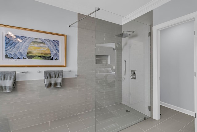 full bathroom with ornamental molding, tile patterned flooring, and tiled shower