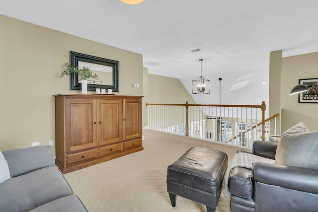 living room with light carpet, lofted ceiling, visible vents, and a notable chandelier