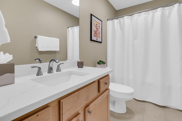 full bath with vanity, toilet, and tile patterned floors