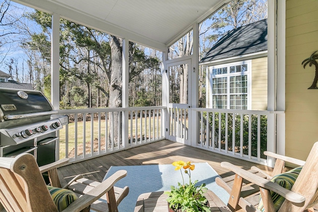 sunroom / solarium featuring plenty of natural light