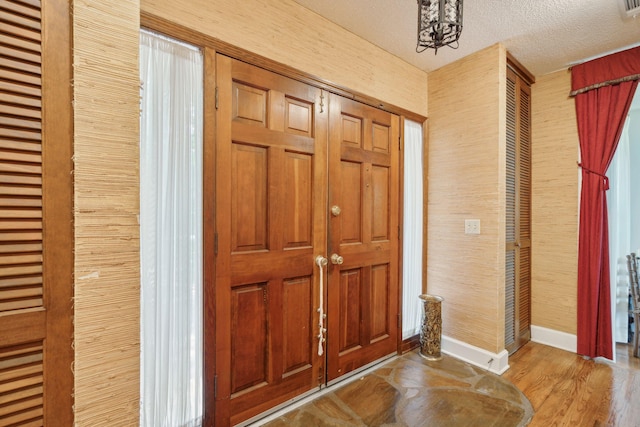 528 Wampler Dr, Charleston, SC 29412 - entryway with baseboards, a textured ceiling, and wood finished floors