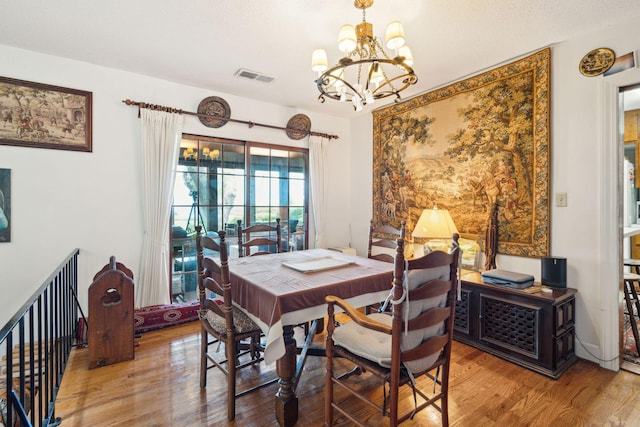 528 Wampler Dr, Charleston, SC 29412 - dining room featuring a chandelier and wood finished floors