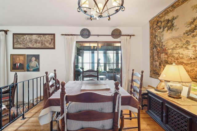528 Wampler Dr, Charleston, SC 29412 - dining room with a chandelier and wood finished floors