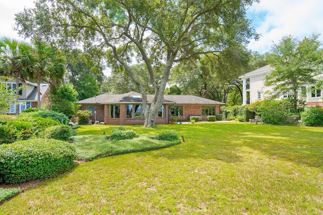528 Wampler Dr, Charleston, SC 29412 - view of front of home featuring a front yard and brick siding