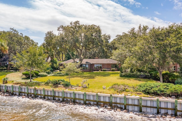 528 Wampler Dr, Charleston, SC 29412 - back of property featuring a yard, a chimney, and a water view