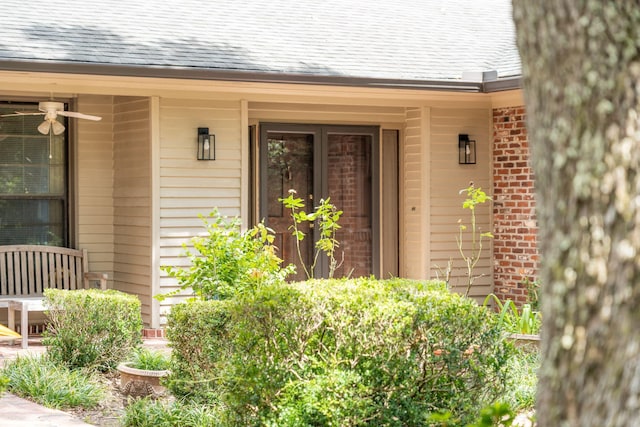528 Wampler Dr, Charleston, SC 29412 - property entrance featuring a shingled roof, covered porch, and brick siding